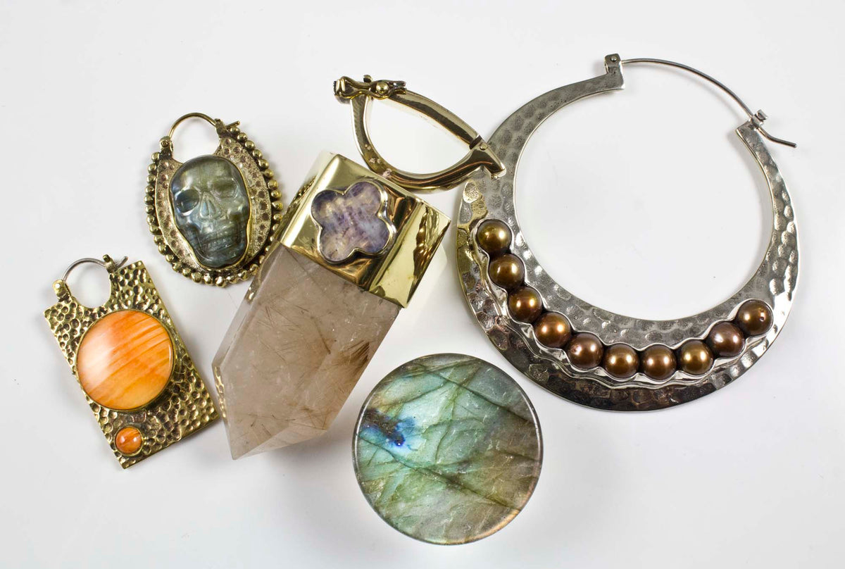Collection of new ear weights and hanging shapes and stone plugs