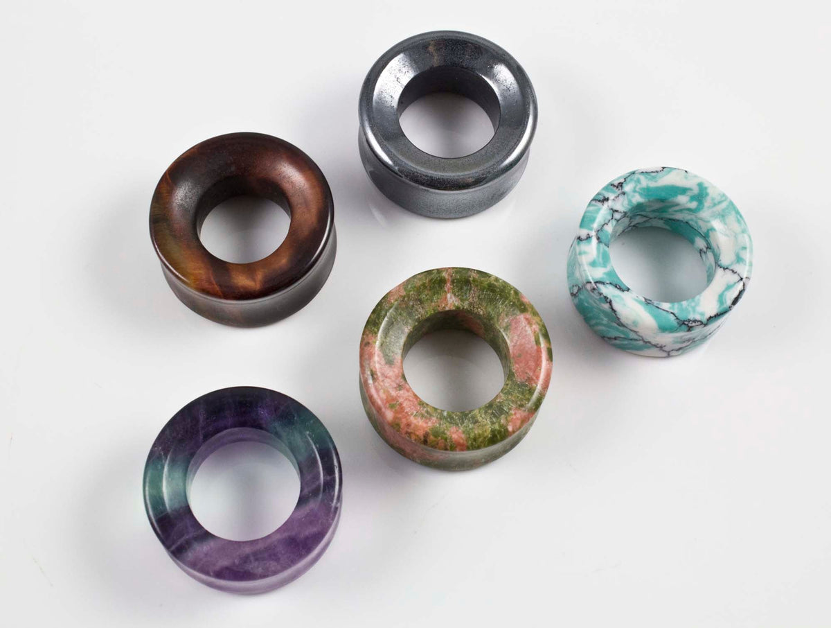 These plugs have double flares and a hole in the center this is the eyelets and tunnels section