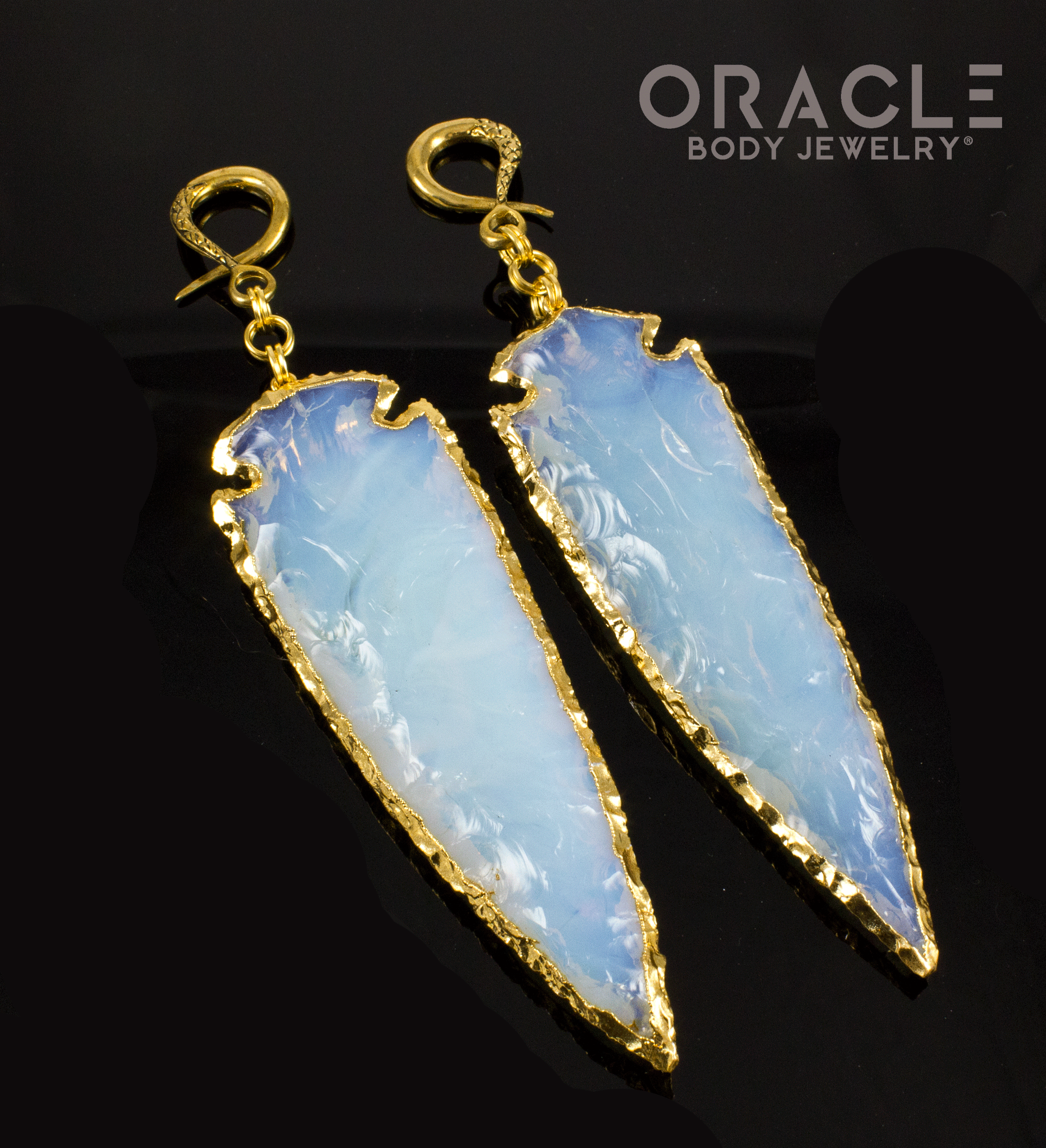 View of the opalite arrowheads on their sides at a 45 degree angle