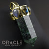 Zuul Pendant with Ruby In Zoisite Point and Labradorite Accents