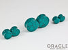 Green Spiderweb Synthetic Turquoise Double Flare Plugs