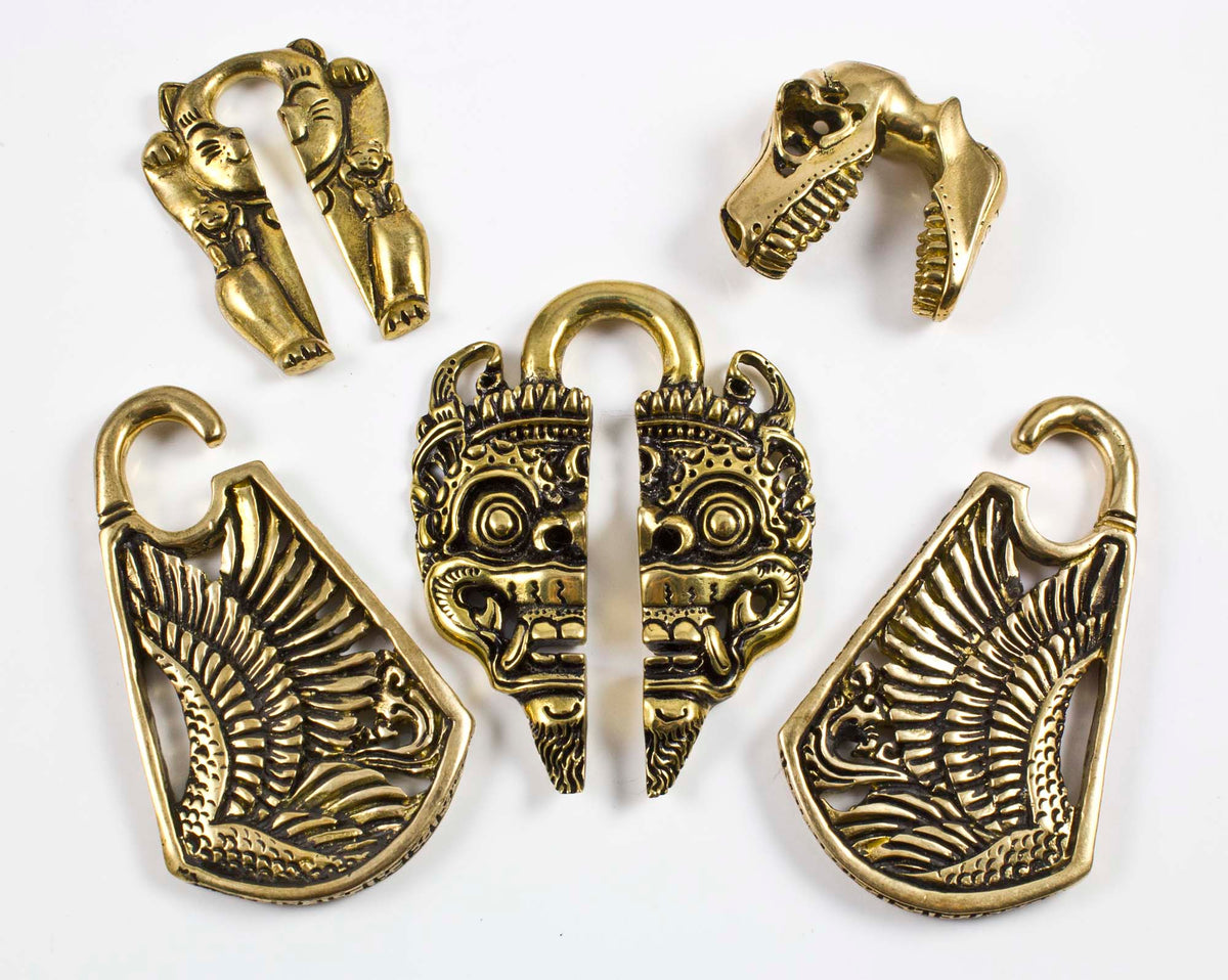 This is the brass and silver ear weights collection 