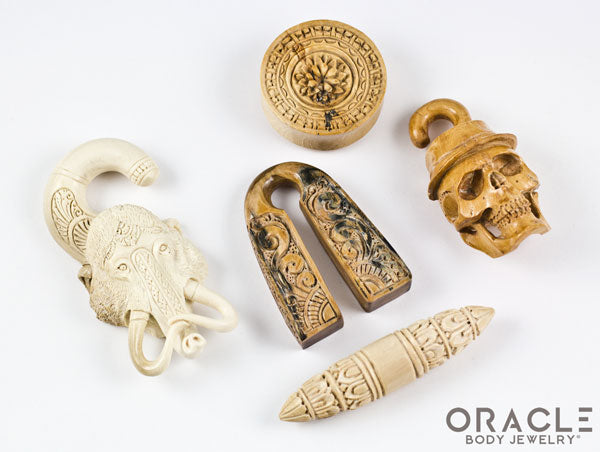 Multiple styles of jewelry featuring fossil mammoth material 