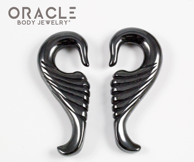 side view of the hematite gray hanging wing shapes 