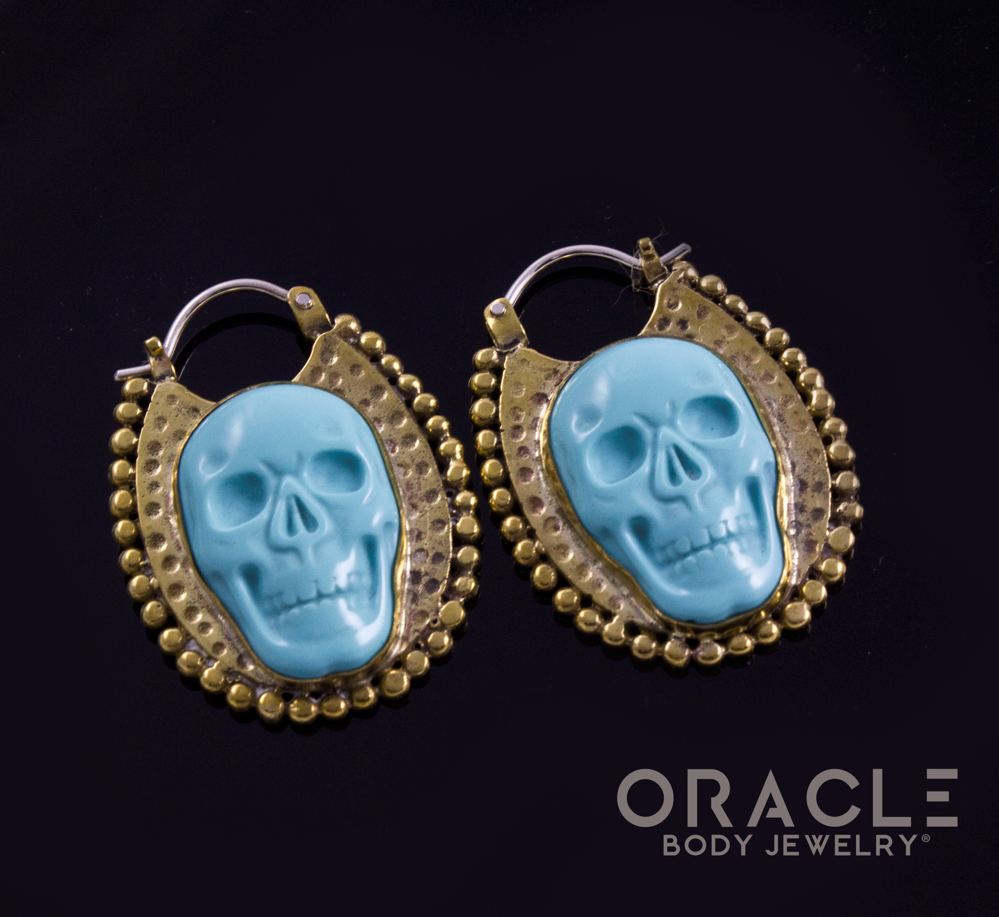 Coven with Carved Turquoise Skulls