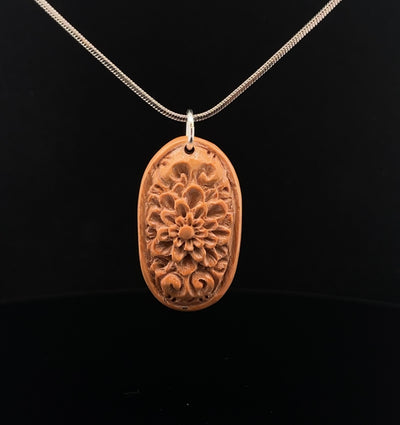 Carved Fossilized Mammoth Ivory Pendant with Chain
